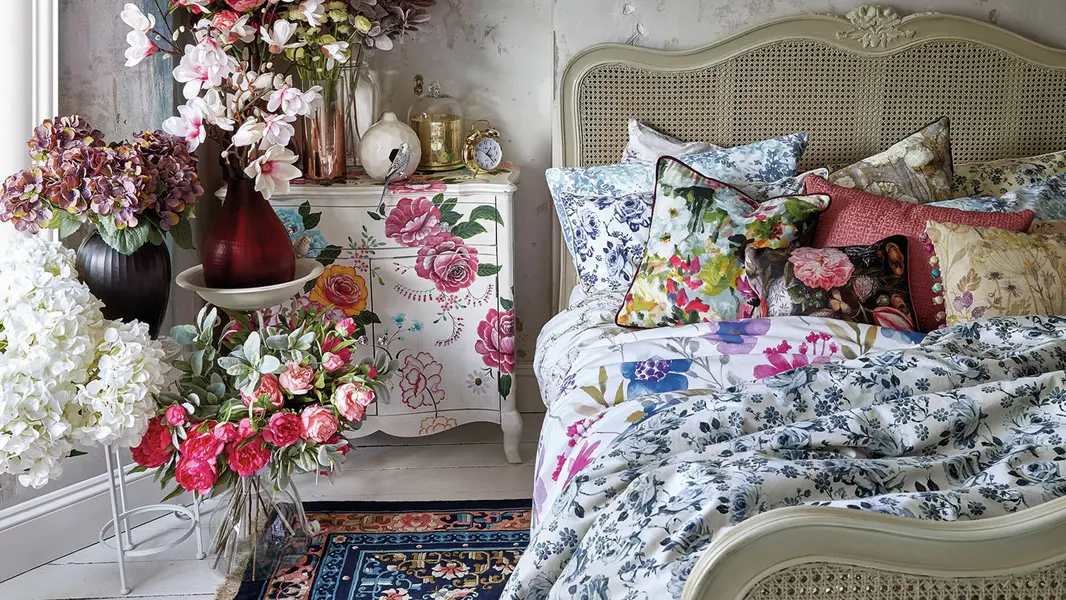 A cozy room enhanced by unique ceramic decor and soft furnishings.